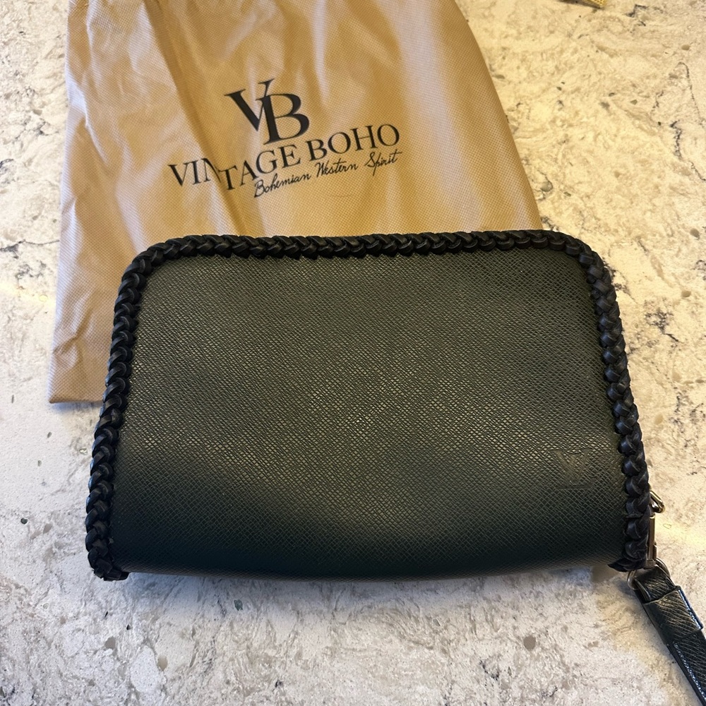 Louis Vuitton Vintage Boho inspired clutch. Very unique